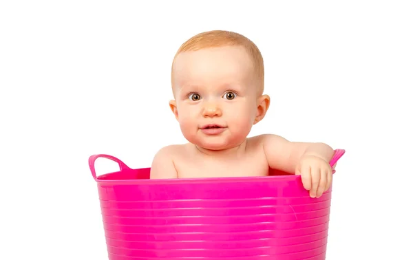 Little baby in plastic bowl — Stock Photo, Image