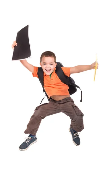 Menino da escola de salto pequeno — Fotografia de Stock