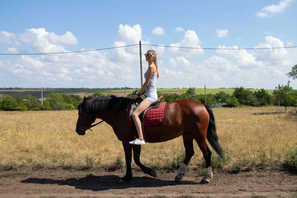 horse ride with a model on a horse in Ukraine in summer
