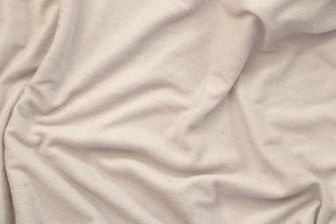 Arkaplan olarak düz beyaz kırışık kumaş, kumaş dokusu