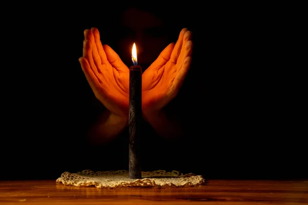 Hand Dark Flame Black Candle Close — Stock Photo, Image