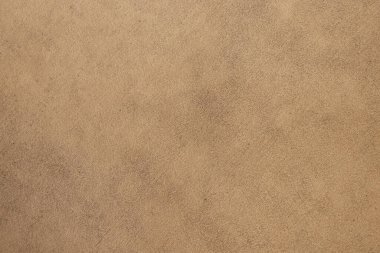 Arkaplan olarak açık bej düz kumaş, koltuk döşemesi