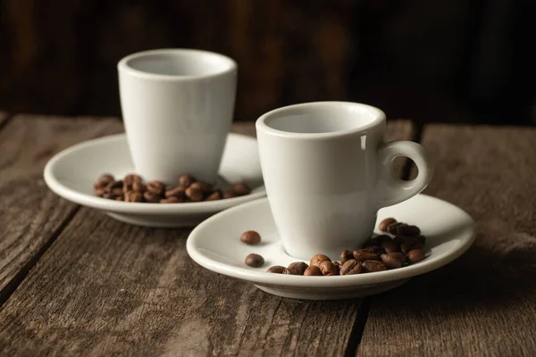 Two White Cups Saucer Grains Coffee Stand Wooden Table Morning — Stok Foto