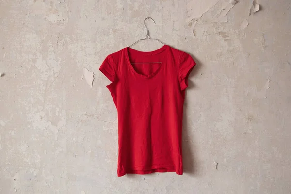 Red Womens Shirt Hanging Hanger Old Dirty White Wall Home — Stock Photo, Image