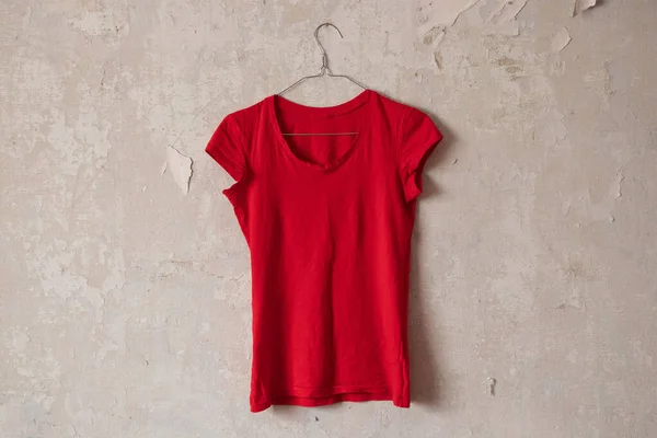 Red Womens Shirt Hanging Hanger Old Dirty White Wall Home — Stock Photo, Image