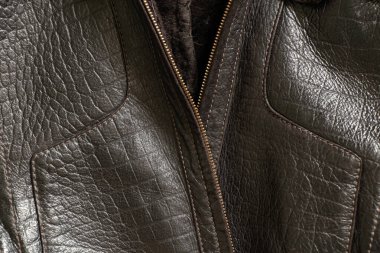 Arka plan olarak deri erkek siyah ceketi.