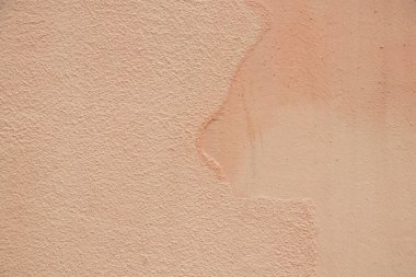 Arka plan olarak şeftali renkli ev duvarı kapat