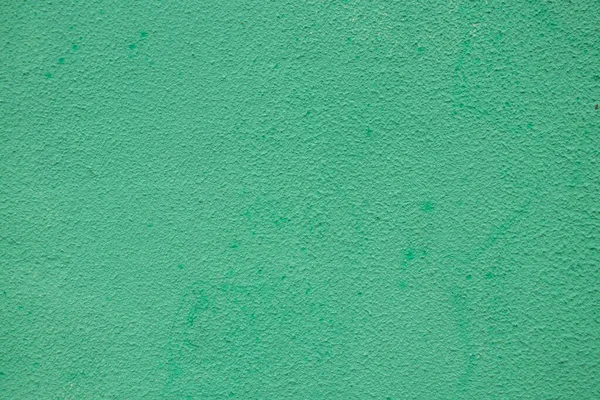 背景としての家の緑の荒い壁は — ストック写真