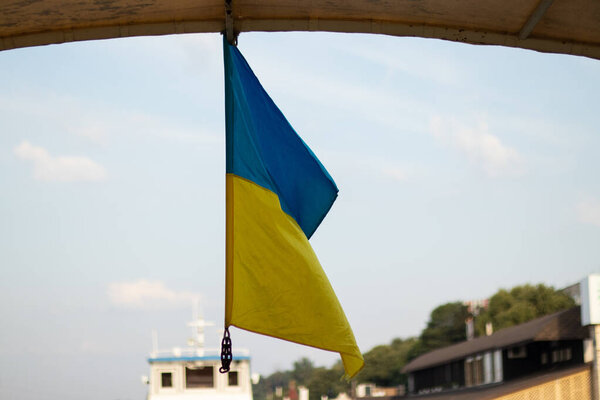 flag of ukraine zholto blue on the background of the sky in the wind