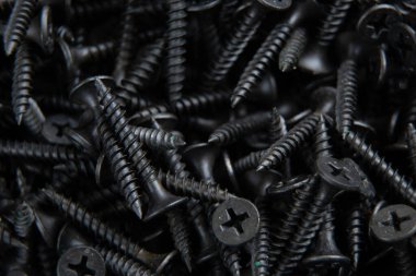 arkaplan makro fotoğrafı olarak birçok siyah vida