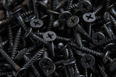 arkaplan makro fotoğrafı olarak birçok siyah vida