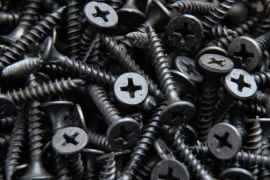 arkaplan makro fotoğrafı olarak birçok siyah vida