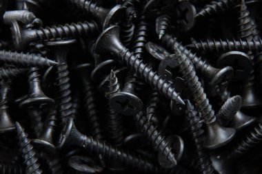 arkaplan makro fotoğrafı olarak birçok siyah vida