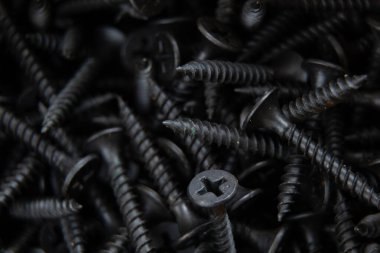 arkaplan makro fotoğrafı olarak birçok siyah vida