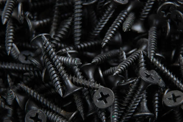 arkaplan makro fotoğrafı olarak birçok siyah vida