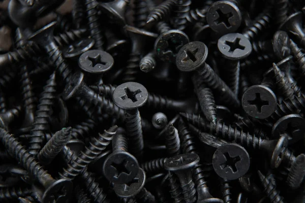 arkaplan makro fotoğrafı olarak birçok siyah vida