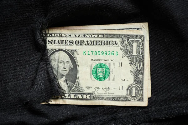 美元钞票是黑色斜纹棉布做的特写 — 图库照片