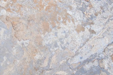 Arka plan olarak yıpranmış alçılı beton duvar, taş duvar
