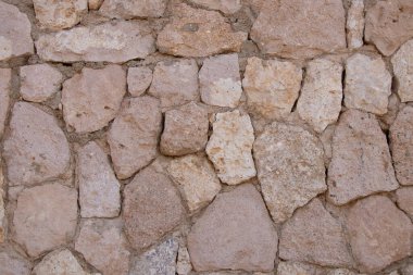 Arkaplan olarak kumlu taş kahverengi duvar