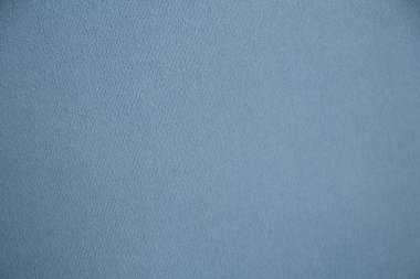 Açık mavi düz yumuşak kumaş arka plan yakın plan olarak