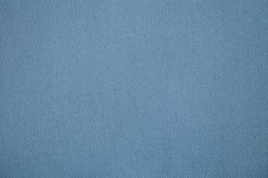 Açık mavi düz yumuşak kumaş arka plan yakın plan olarak