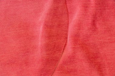 Düz kırmızı buruşuk kumaş arka plan yakın plan olarak