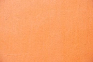 Açık turuncu boyalı duvar arka plan yakın plan, pembe arkaplan