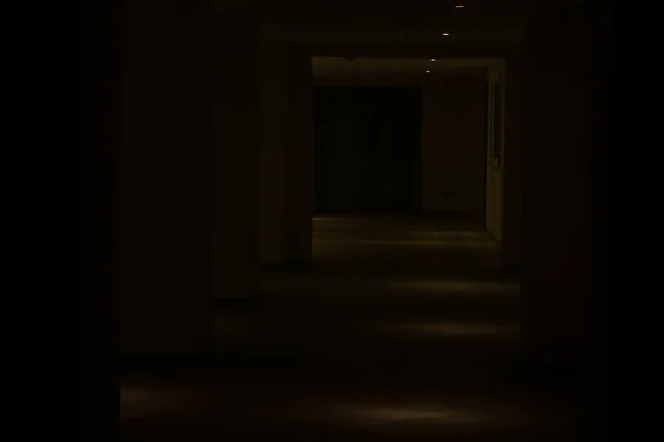 dark long corridor in the hotel, corridor in the dark