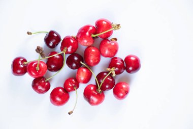 ripe red cherry on isolated background, fruit background, fruits