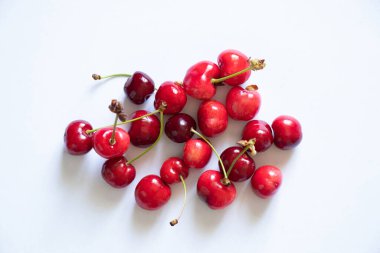 ripe red cherry on isolated background, fruit background, fruits