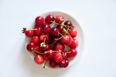ripe red cherry on isolated background, fruit background, fruits