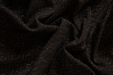parlak lekeli siyah buruşuk kumaş, arka plan için makro fotoğraf