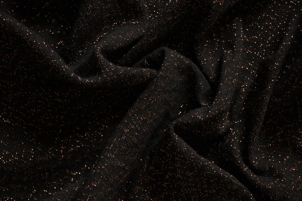 parlak lekeli siyah buruşuk kumaş, arka plan için makro fotoğraf