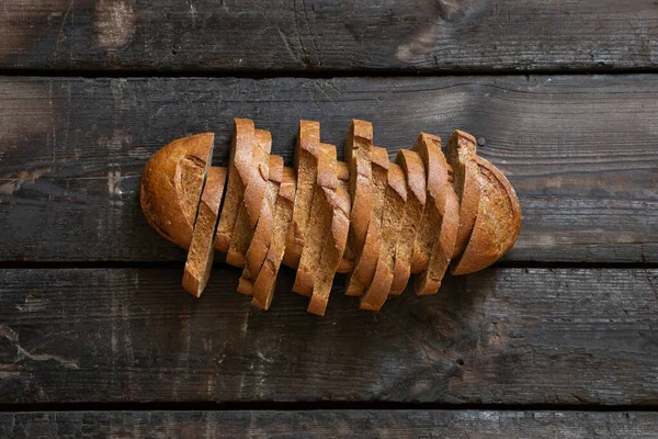 Whole Loaf Black Sliced Bread Lies Table Store Black Bread — Stock Photo, Image