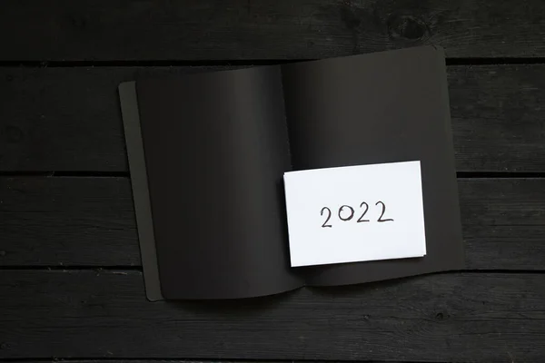 Svart Anteckningsbok Med Vitt Ark Och Text Det 2022 Svart — Stockfoto