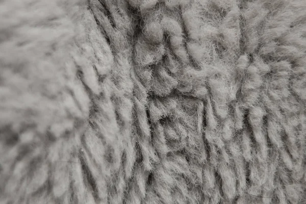 背景マクロ写真としての灰色の人工毛毛皮背景 — ストック写真