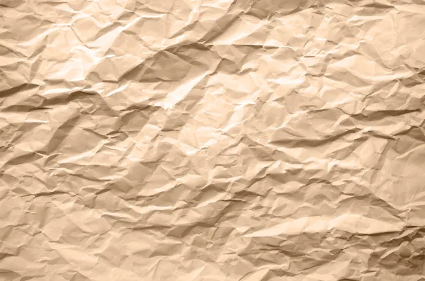 Textura marrón claro de papel arrugado — Vector de stock