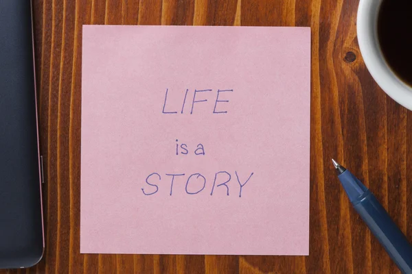 Sticky note with tex life is a story — Stock Photo, Image
