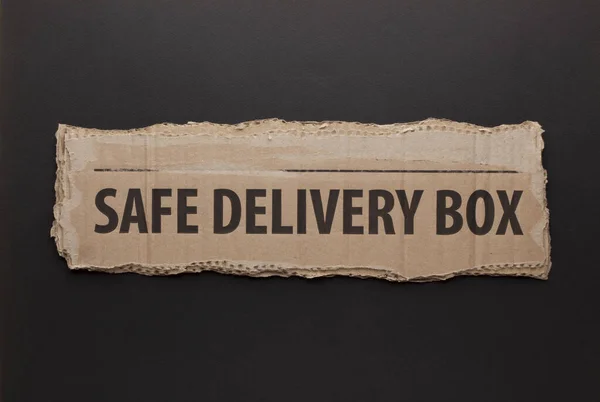 Safe Delivery Box Texte Sur Papier Déchiré Sur Fond Noir — Photo