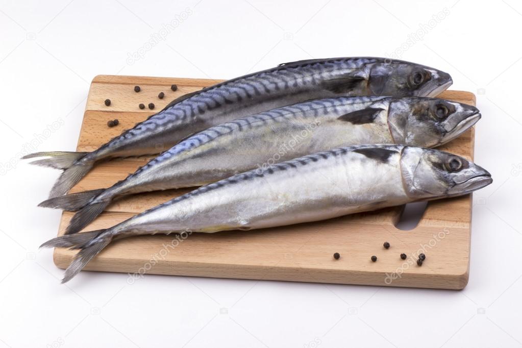 Mackerel fish on cutting board