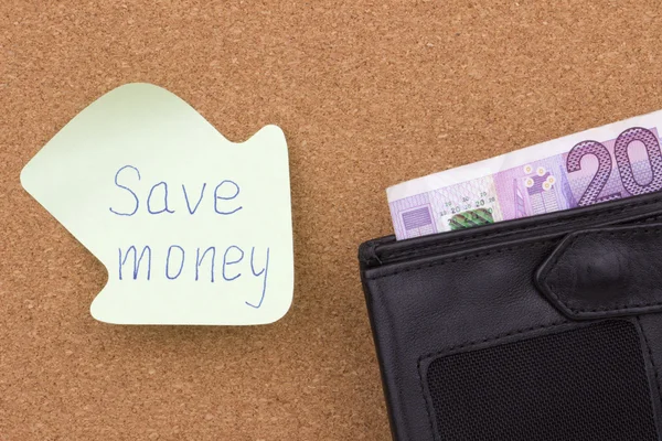 Économisez de l'argent écrit sur une note collante — Photo
