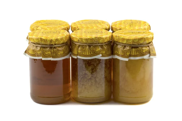 Frascos de miel aislada blanca —  Fotos de Stock