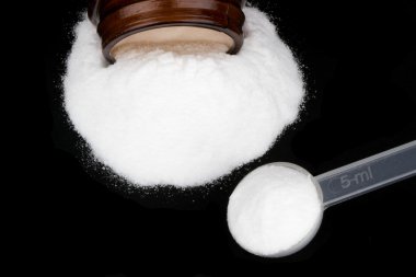 Creatine isolated on black clipart
