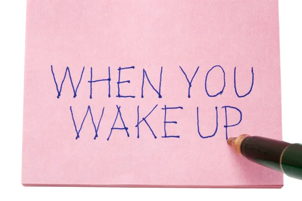 Wenn du aufwachst, geschrieben auf eine Notiz — Stockfoto