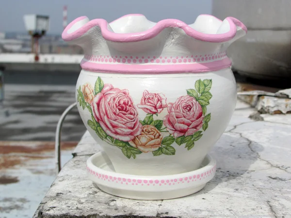 Decoupage on flower pot Stock Photo