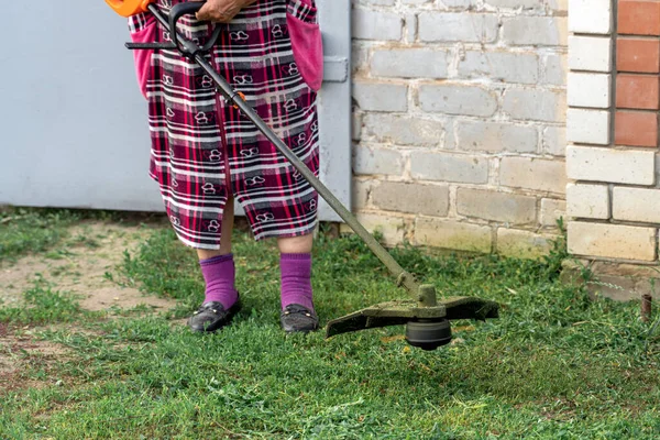 Senior Women Gas Mower Her Hands Mowing Grass Front House — Foto de Stock