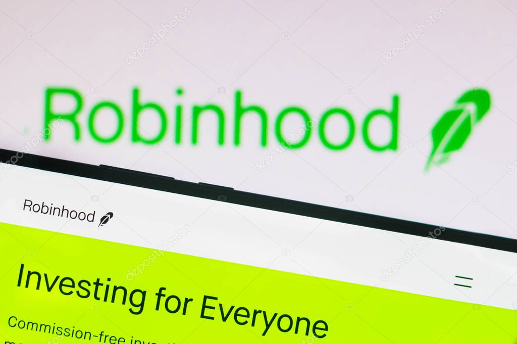 March 28, 2021, Brazil. In this photo illustration the Robinhood Markets logo is seen on a smartphone and a pc screen
