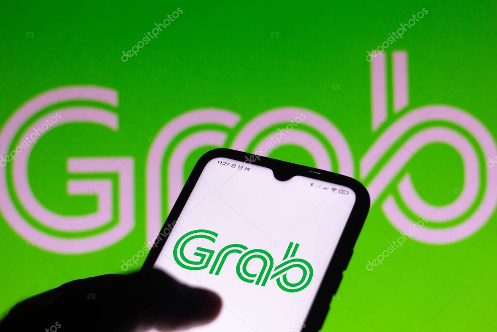 April 14, 2021, Brazil. In this photo illustration the Grab Holdings logo seen displayed on a smartphone screen