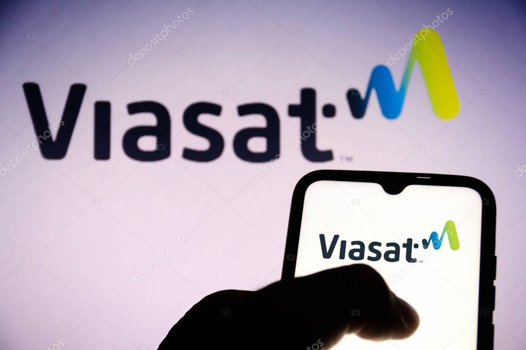 June 16, 2021, Brazil. In this photo illustration an ViaSat logo seen on a smartphone screen and in the background