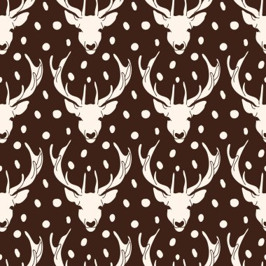 Kahverengi yüzeyde deri dokusuna sahip taşıyıcı ren geyiği başı